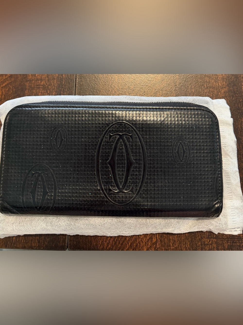 Authentic Cartier Black Embossed Logo Zip Wallet